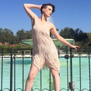 Sequined Kimchi Blue beige fringe party dress.